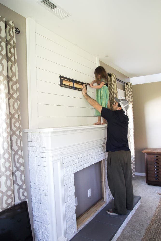 DIY Faux Fireplace Updated | unigumushane.com - This fireplace looks so real and it cost about $600 to build!