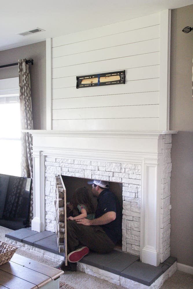 DIY Faux Fireplace Updated | unigumushane.com - This fireplace looks so real and it cost about $600 to build!