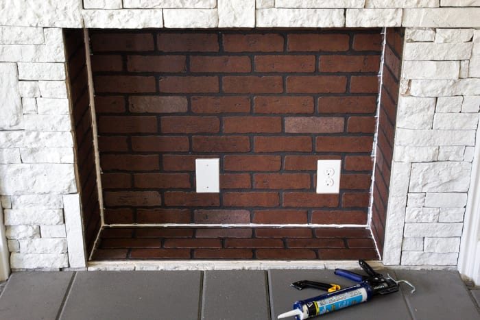 DIY Faux Fireplace Updated | unigumushane.com - This fireplace looks so real and it cost about $600 to build!