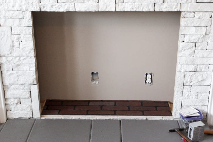 DIY Faux Fireplace Updated | unigumushane.com - This fireplace looks so real and it cost about $600 to build!