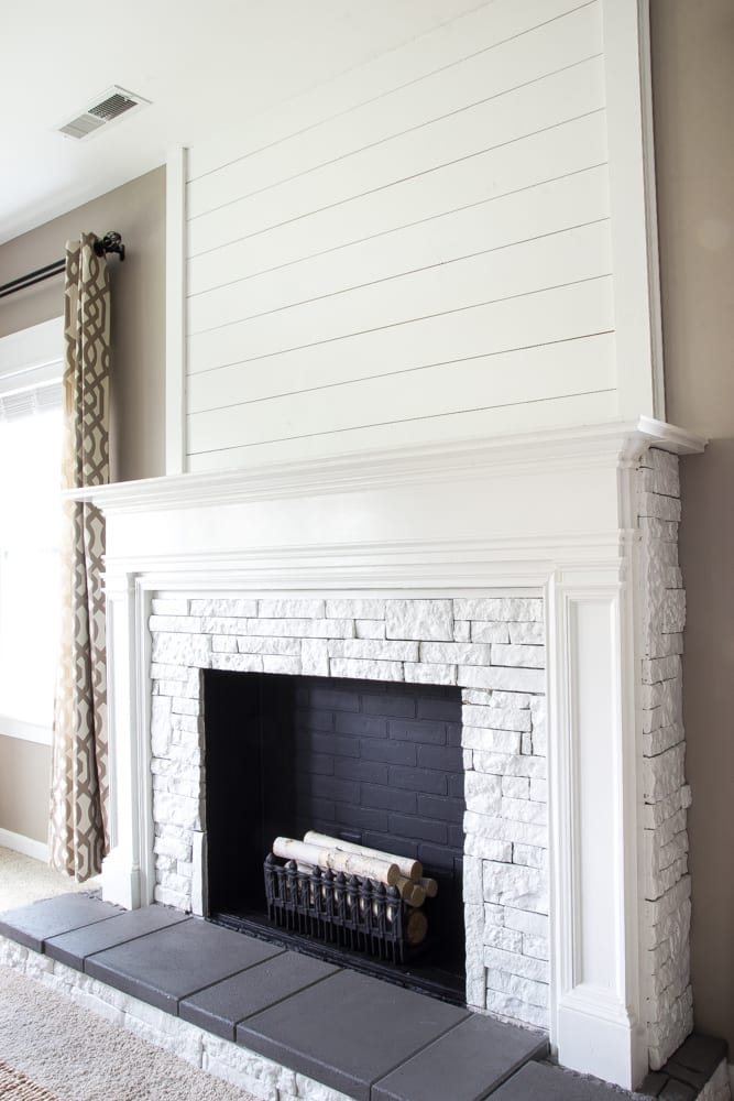 DIY Faux Fireplace Updated | unigumushane.com - This fireplace looks so real and it cost about $600 to build!