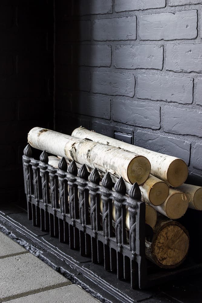 DIY Faux Fireplace Updated | unigumushane.com - This fireplace looks so real and it cost about $600 to build!