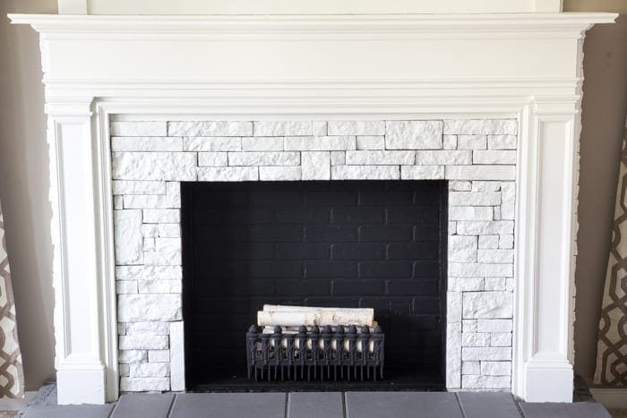DIY Faux Fireplace Updated | unigumushane.com - This fireplace looks so real and it cost about $600 to build!