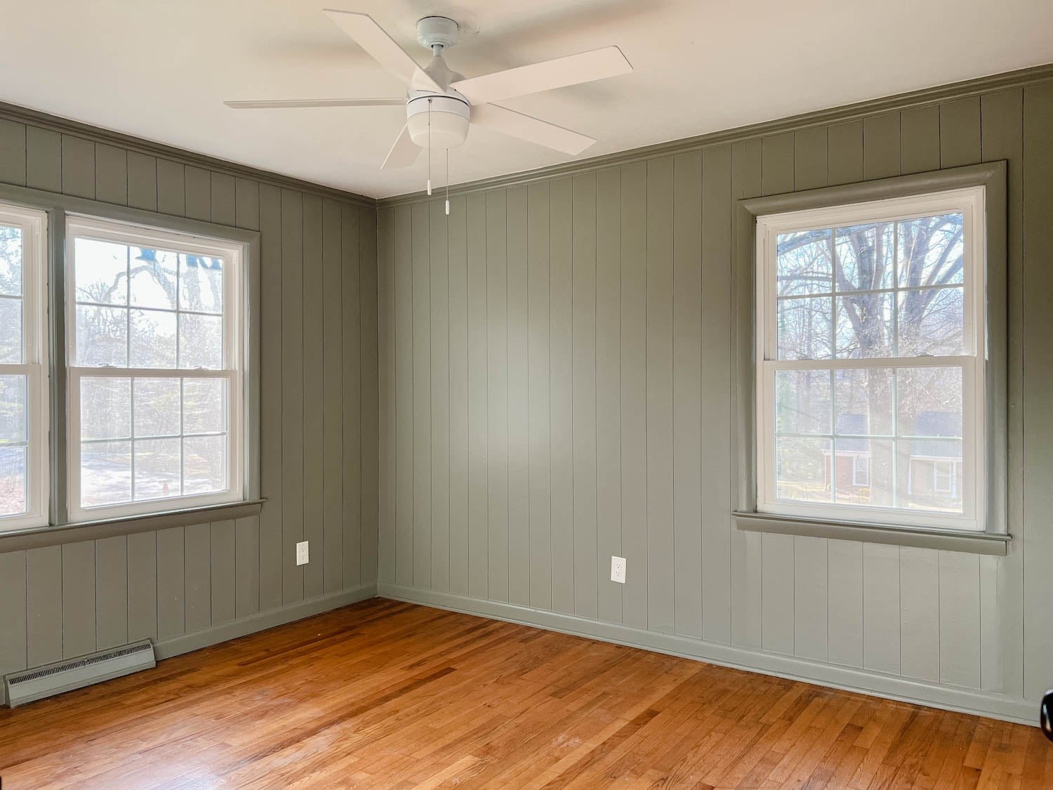 DIY faux wall planking in a bedroom using a Sharpie paint pen painted Sherwin Williams Evergreen Fog