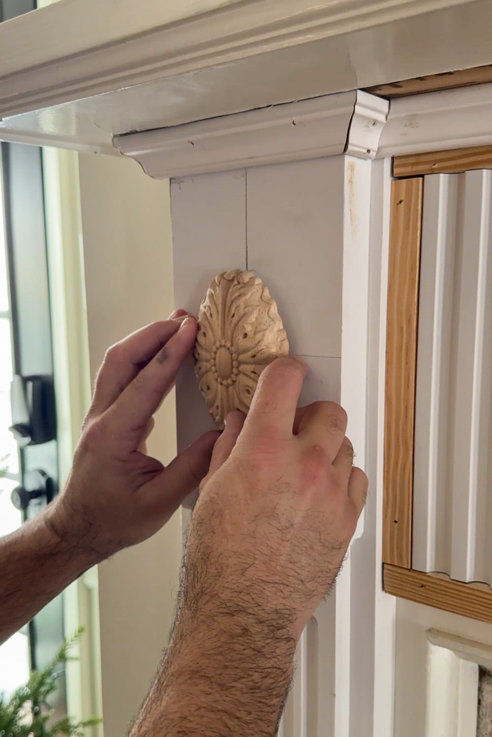 adding rosette overlay molding to fireplace