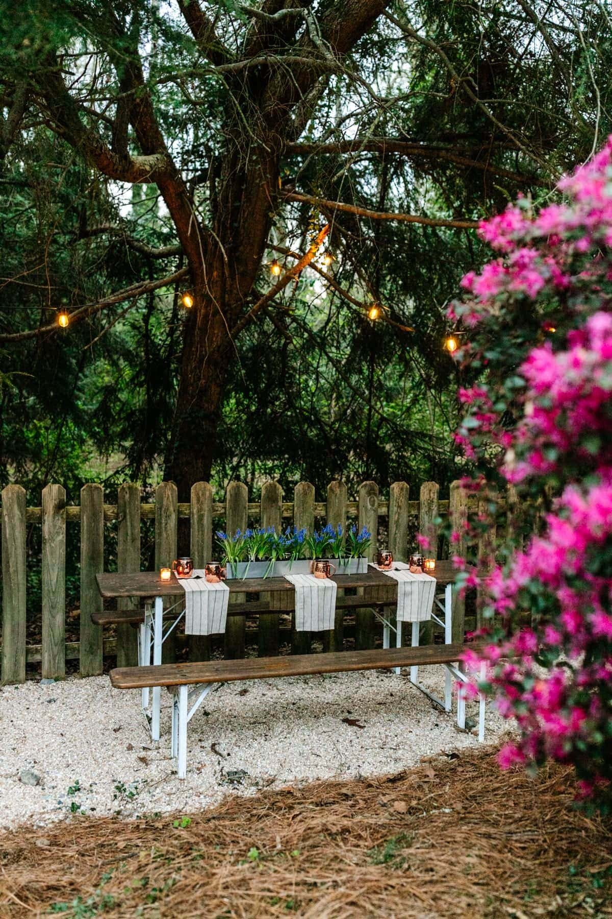 Using pea gravel and string lights to make a DIY beer garden dining area