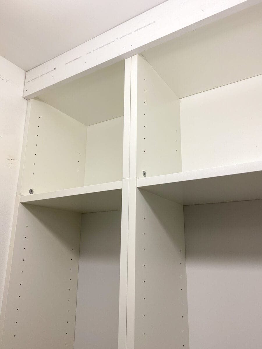 IKEA Closets Using Billy Bookcases | A step-by-step tutorial and budget breakdown for using IKEA Billy bookcases to customize his & her closets in a master bedroom.
