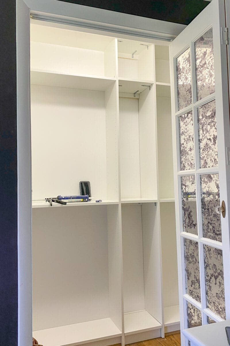 IKEA Closets Using Billy Bookcases | A step-by-step tutorial and budget breakdown for using IKEA Billy bookcases to customize his & her closets in a master bedroom.