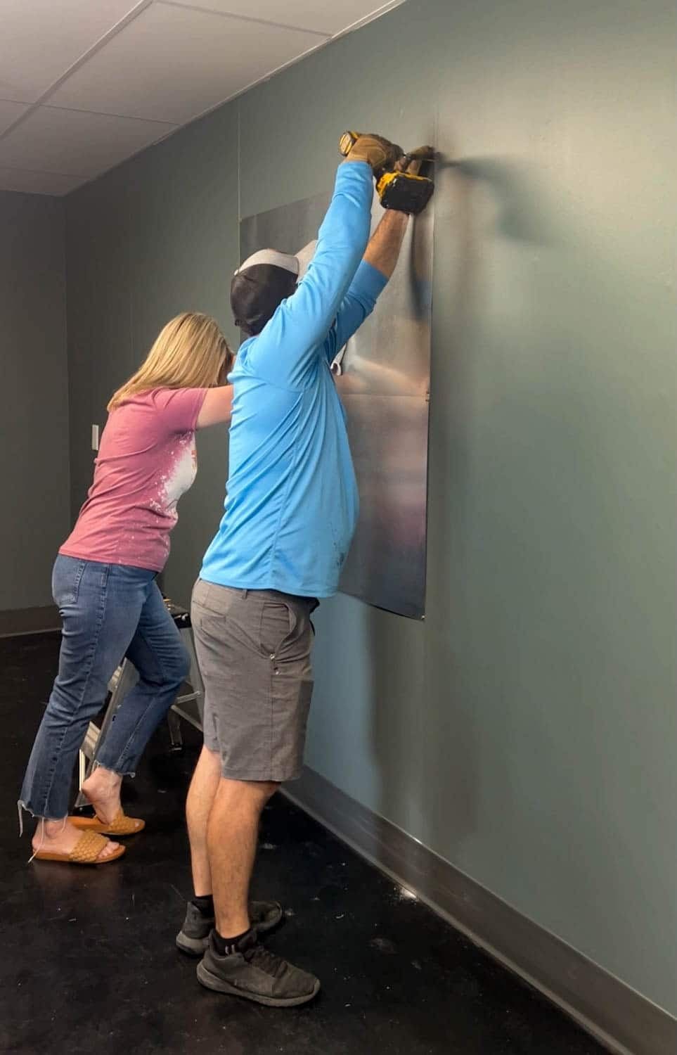 attaching sheet metal to a wall to make a DIY memo board