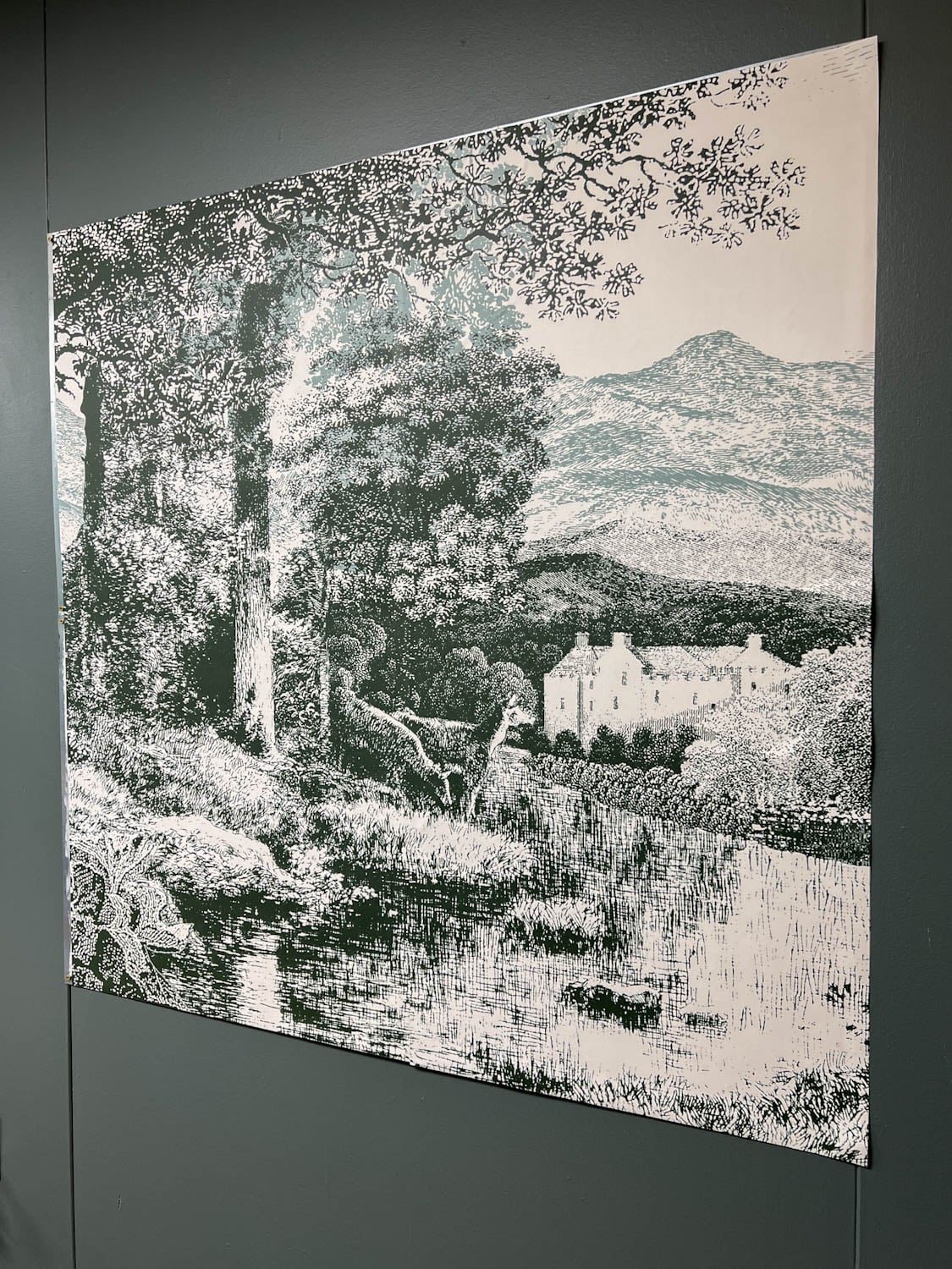 wallpaper mural applied to metal on a wall