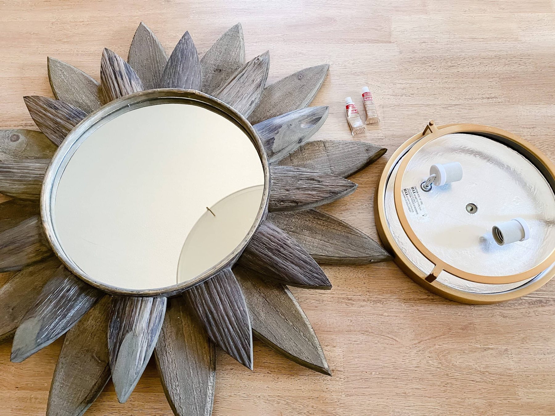 sunburst mirror and flush mount light fixture to make a statement making DIY light