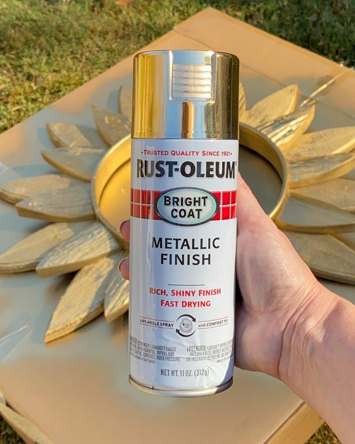 painting a sunburst mirror to make a diy light