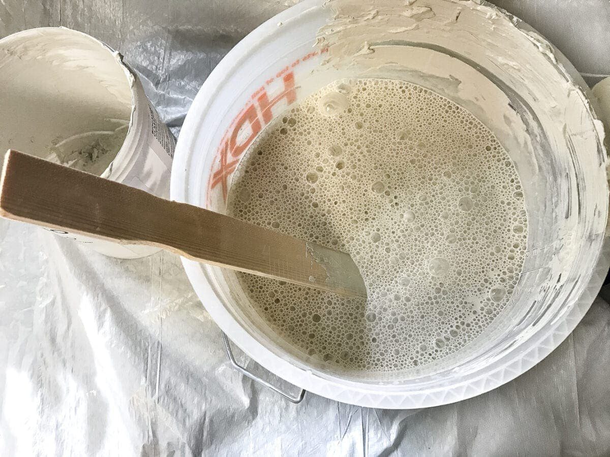 mixing slaked lime and water