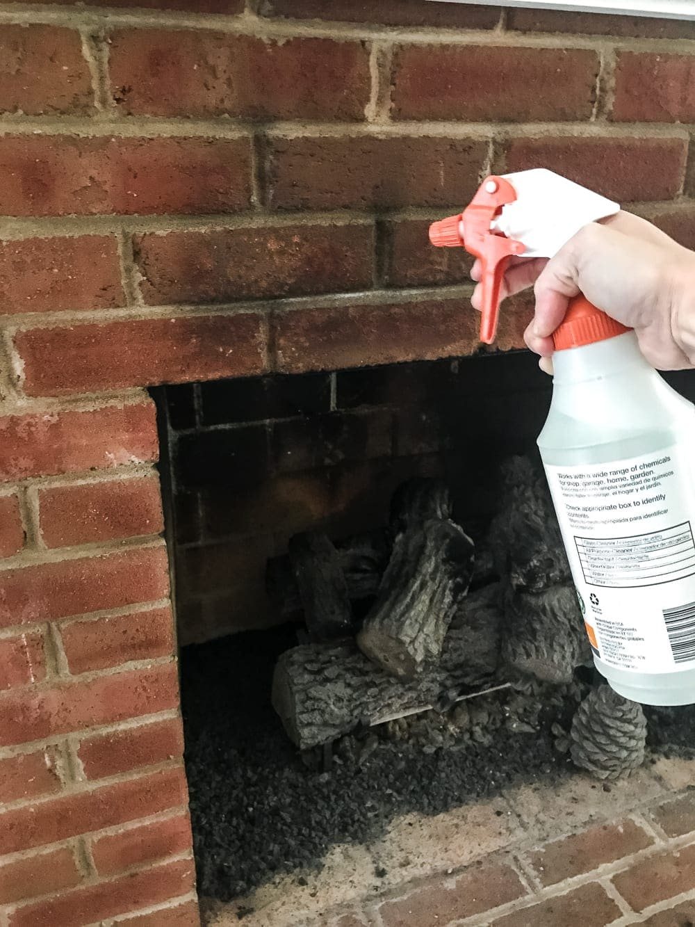 spray sooty dirty bricks with vinegar to clean