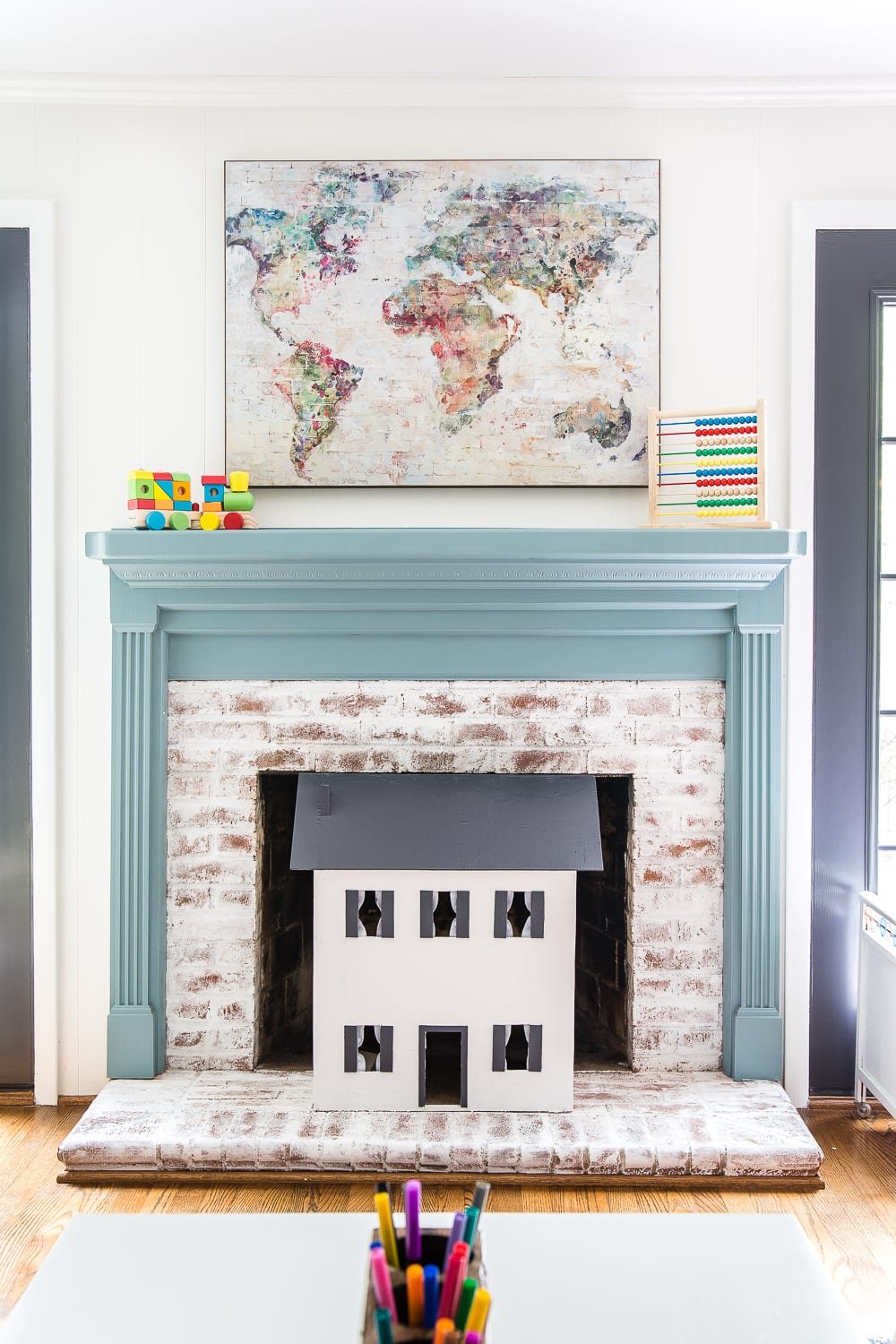 playroom fireplace with dollhouse fireplace screen