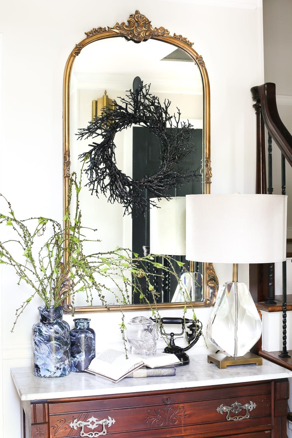 DIY Marbled Vases and Halloween Entryway | unigumushane.com - A quick tutorial for how to turn old jars and bottles into marbled vases (using nail polish) on the cheap that are modern works of art.