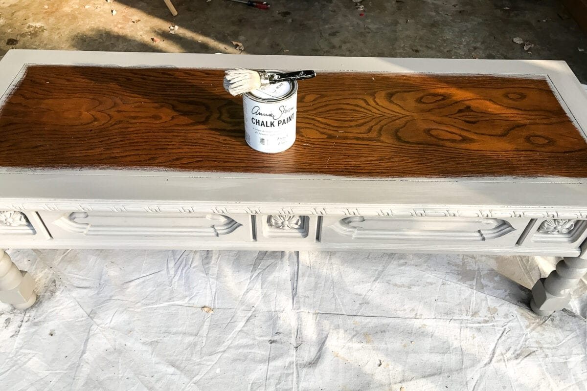 DIY Ottoman Bench from a Repurposed Thrift Store Coffee Table | unigumushane.com - How to repurpose an old coffee table into a designer-inspired ottoman bench with tips for getting a faux weathered wood look and how to tuft upholstery #furnituremakeover #ottoman #coffeetable