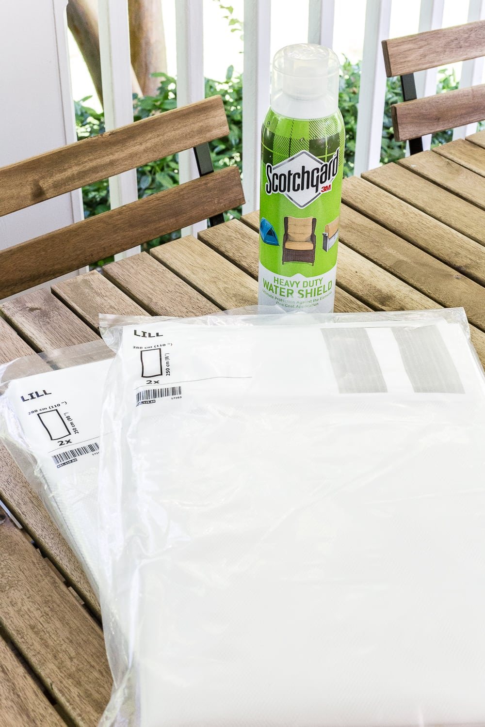 DIY outdoor curtains using Scotchgard to weather-proof them