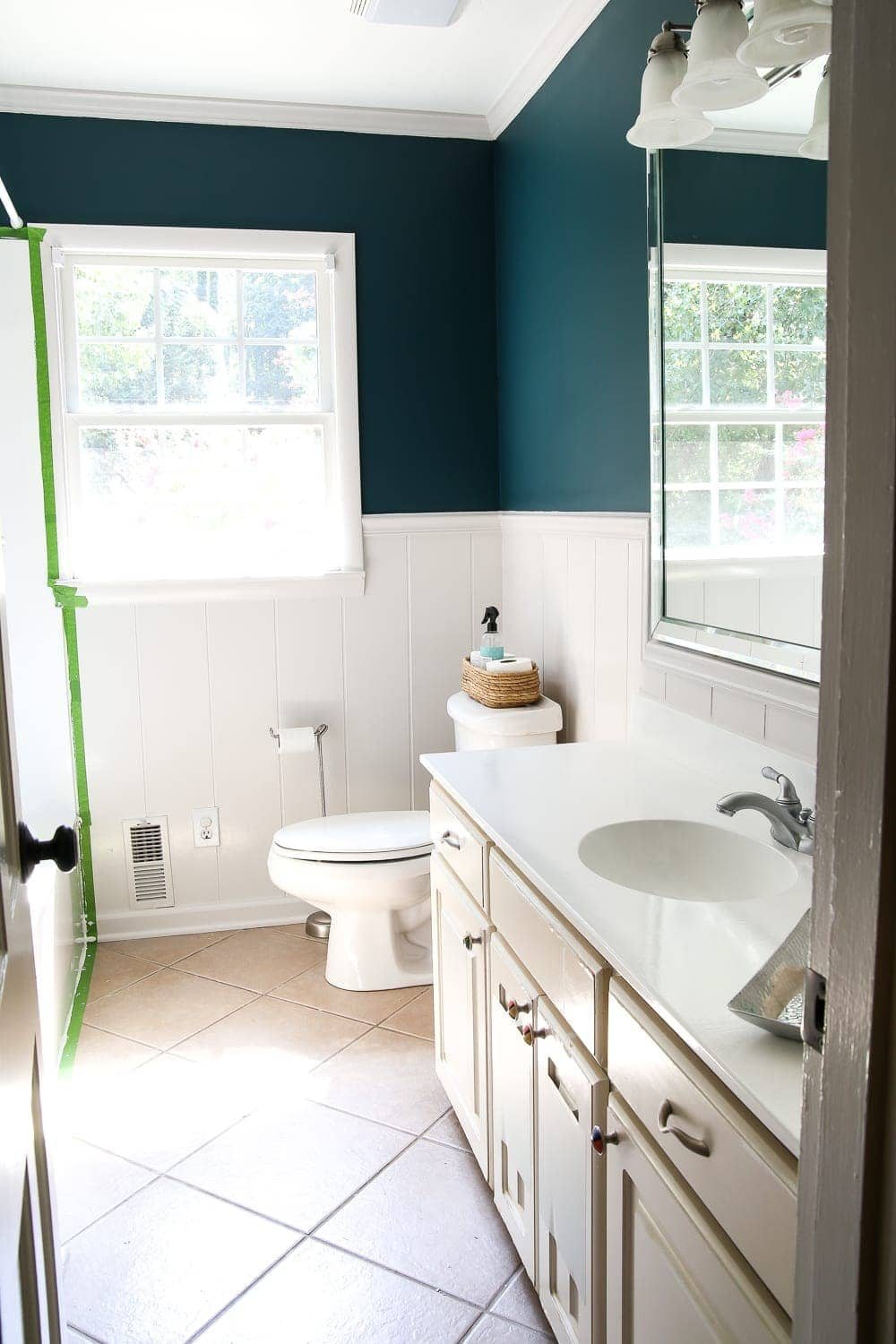 the newly painted bathroom sink countertop in white