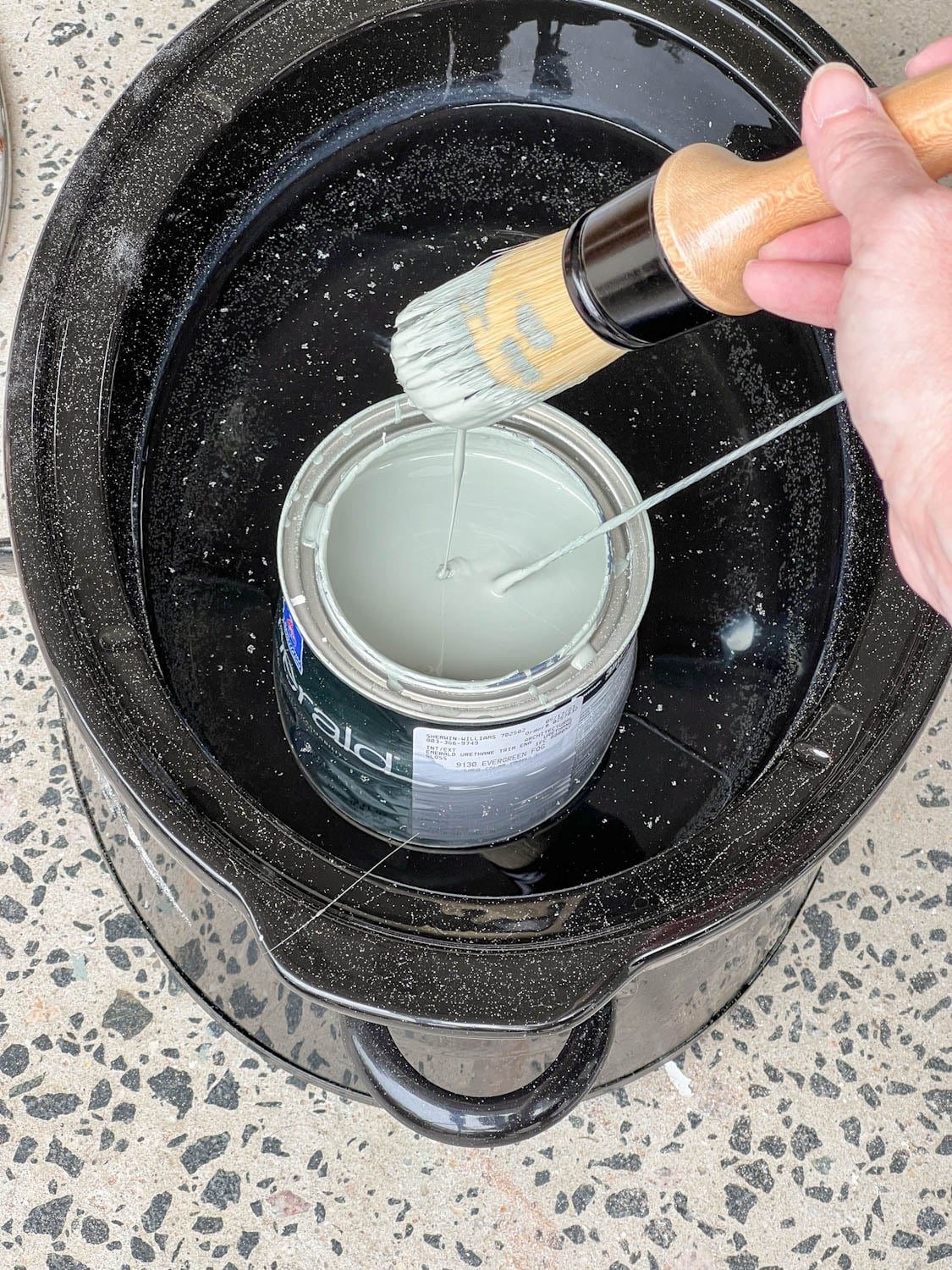 warming a can of gloss paint in a slow cooker for smooth paint finish