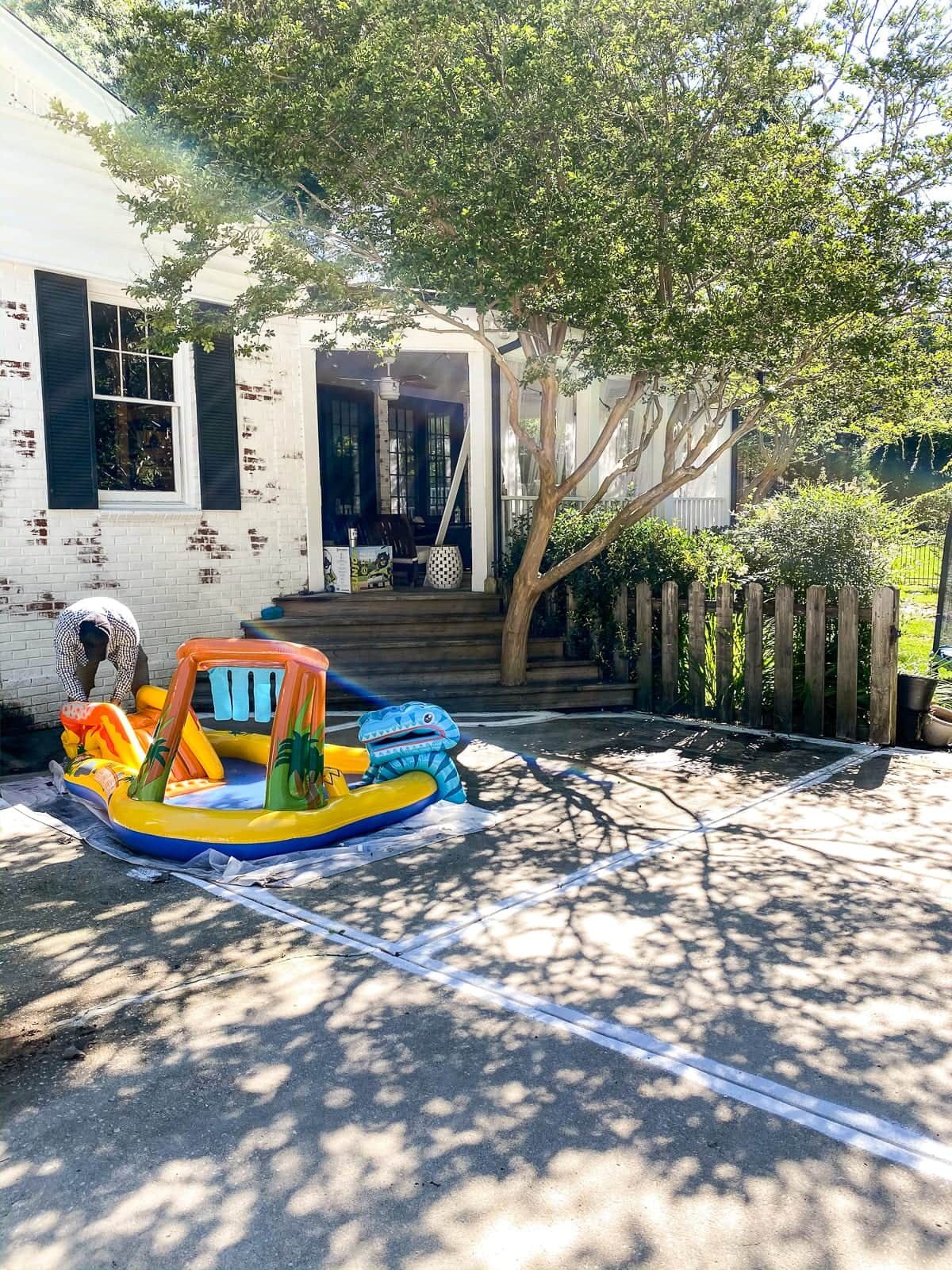 pool deck and patio before with paint mistake