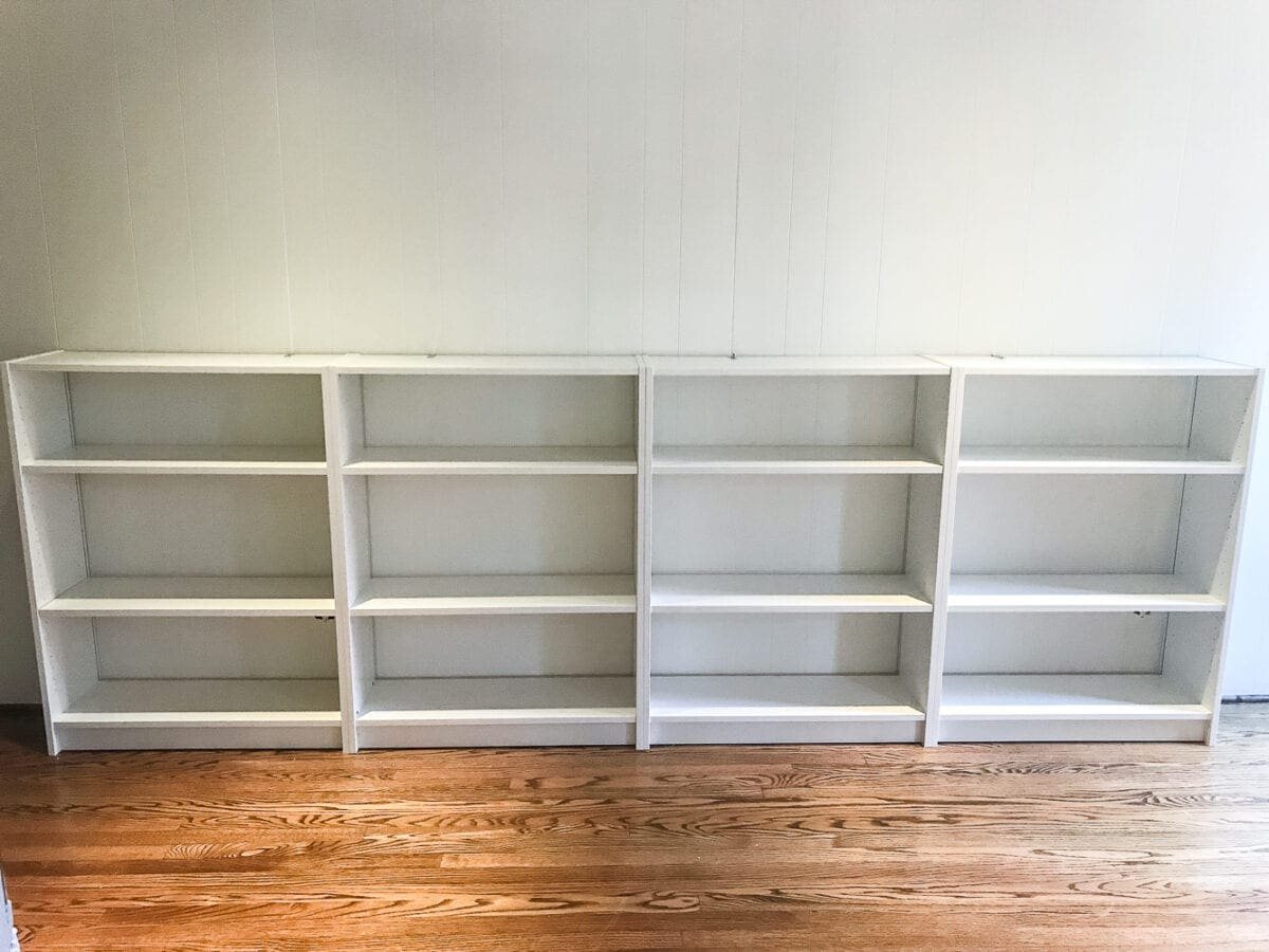 An easy to follow step-by-step tutorial showing how to build bookcase built-ins using IKEA Billy bookcases. #IKEAhack #homeimprovement #build #playroom