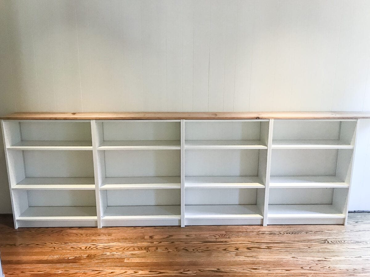 An easy to follow step-by-step tutorial showing how to build bookcase built-ins using IKEA Billy bookcases. #IKEAhack #homeimprovement #build #playroom