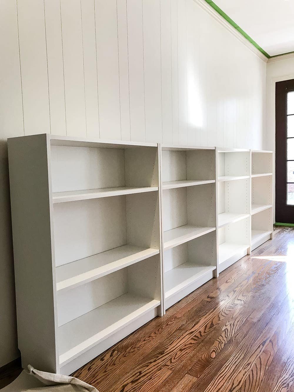 An easy to follow step-by-step tutorial showing how to build bookcase built-ins using IKEA Billy bookcases. #IKEAhack #homeimprovement #build #playroom