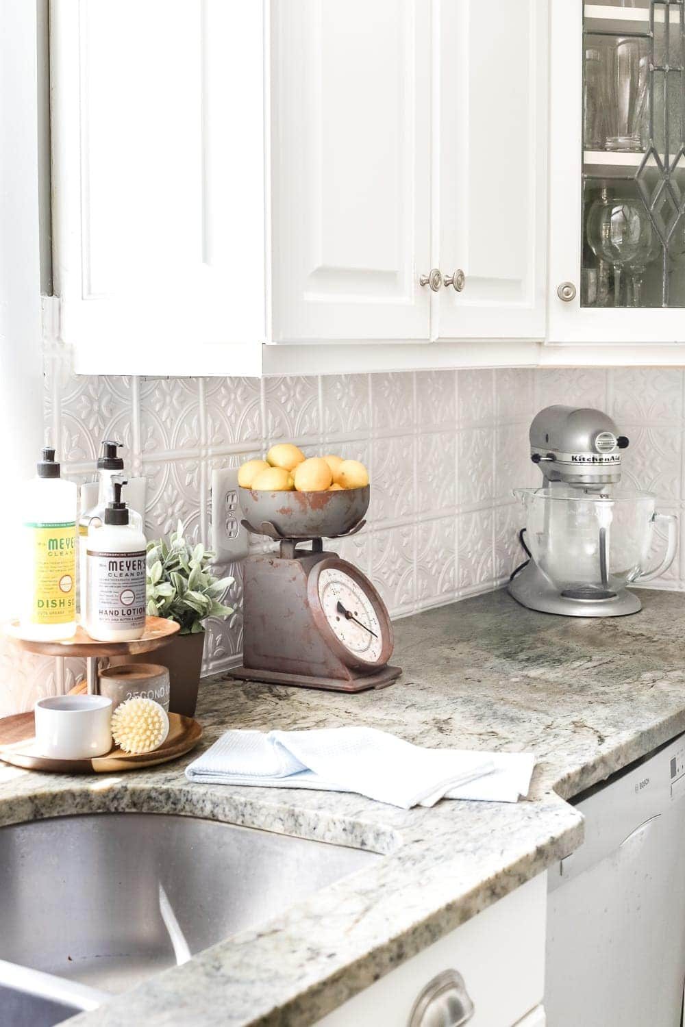 DIY Pressed Tin Kitchen Backsplash | unigumushane.com - How to makeover a kitchen backsplash with a pressed tin farmhouse style inexpensively and in 6 hours, no power tools required.