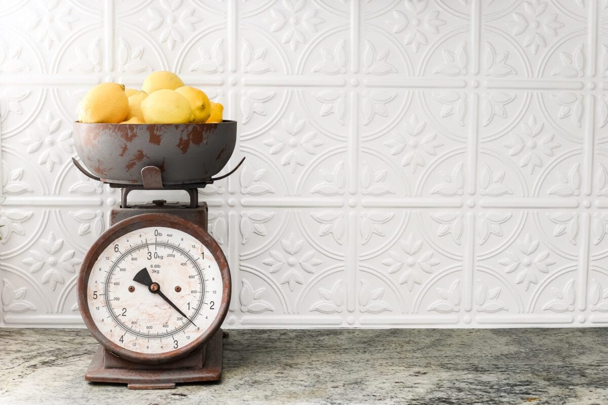 DIY Pressed Tin Kitchen Backsplash | unigumushane.com - How to makeover a kitchen backsplash with a pressed tin farmhouse style inexpensively and in 6 hours, no power tools required.
