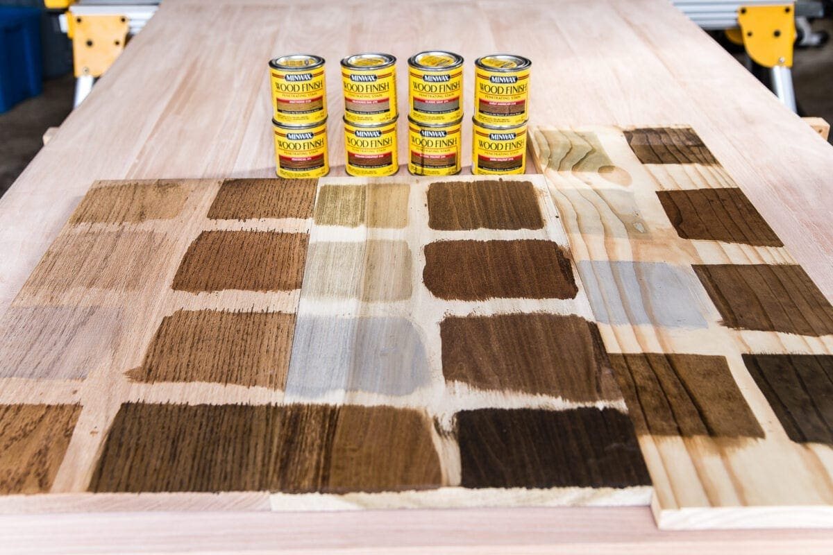 A tutorial for how to build a retrofitted table top to fit over any existing table using Minwax Dark Walnut stain. #build #furniturebuilding #tabletop #diningtable #diytable #farmhousetable #diyfurniture #woodworking #furnituremakeover #tablemakeover #minwax #woodstain #walnut