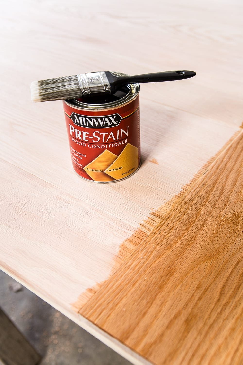 A tutorial for how to build a retrofitted table top to fit over any existing table using Minwax Dark Walnut stain. #build #furniturebuilding #tabletop #diningtable #diytable #farmhousetable #diyfurniture #woodworking #furnituremakeover #tablemakeover #minwax #woodstain #walnut