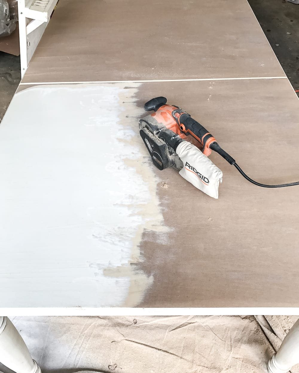 A tutorial for how to build a retrofitted table top to fit over any existing table using Minwax Dark Walnut stain. #build #furniturebuilding #tabletop #diningtable #diytable #farmhousetable #diyfurniture #woodworking #furnituremakeover #tablemakeover #minwax #woodstain #walnut