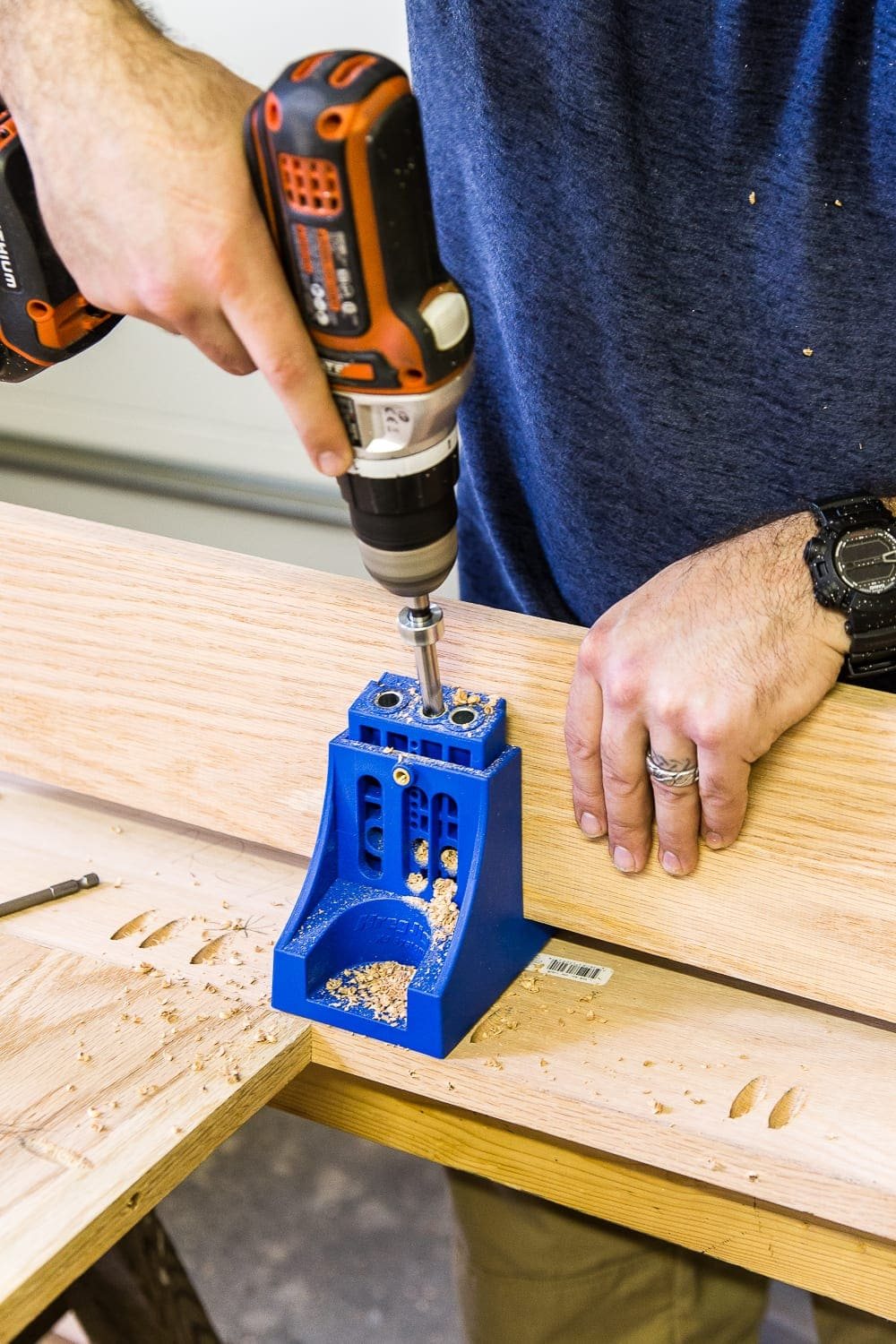 A tutorial for how to build a retrofitted table top to fit over any existing table using Minwax Dark Walnut stain. #build #furniturebuilding #tabletop #diningtable #diytable #farmhousetable #diyfurniture #woodworking #furnituremakeover #tablemakeover #minwax #woodstain #walnut