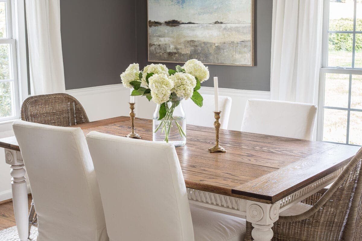 A tutorial for how to build a retrofitted table top to fit over any existing table using Minwax Dark Walnut stain. #build #furniturebuilding #tabletop #diningtable #diytable #farmhousetable #diyfurniture #woodworking #furnituremakeover #tablemakeover #minwax #woodstain #walnut