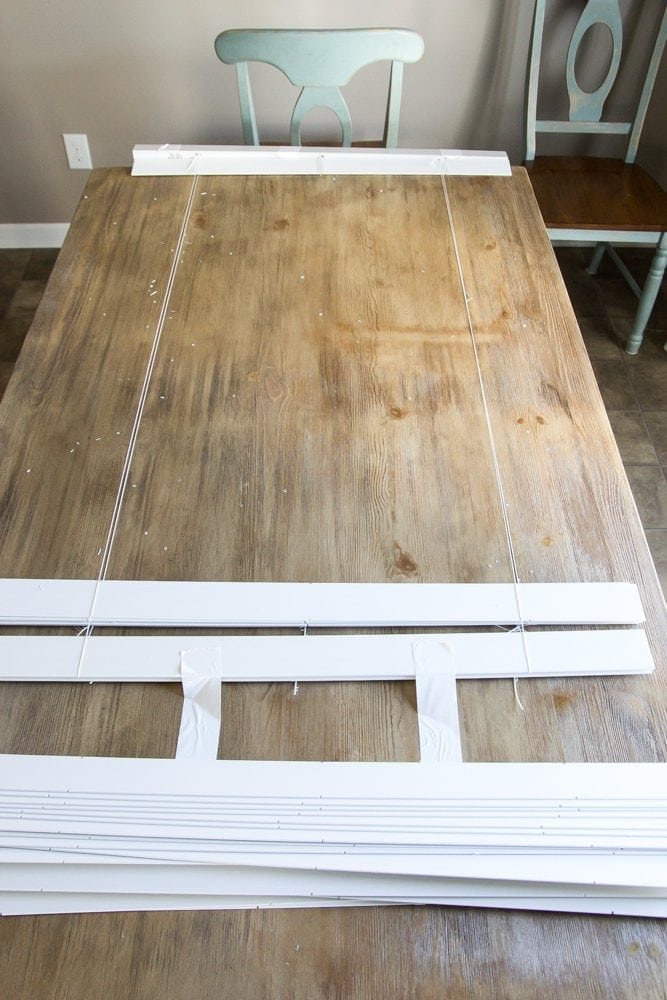 DIY Burlap Roman Shades from Blinds | unigumushane.com - A beautiful way to make pricey looking window shades for cheap!