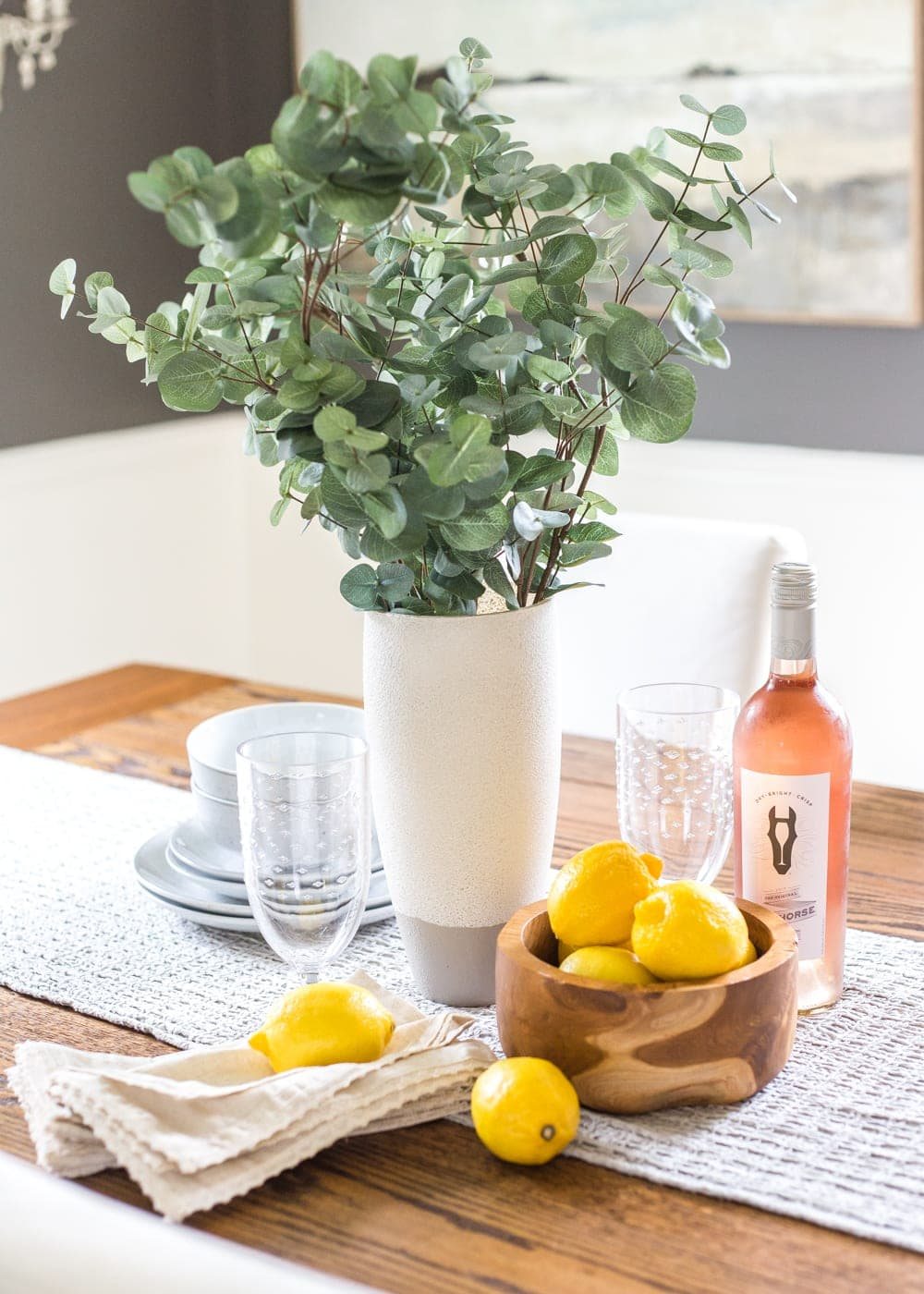 How to add a stoneware look to thrifted glass vases and bottles using just paint. #stoneware #diystoneware #stonewarevase
