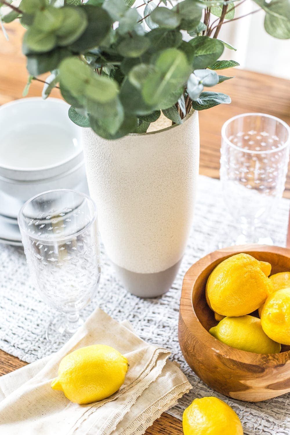 How to add a stoneware look to thrifted glass vases and bottles using just paint. #stoneware #diystoneware #stonewarevase