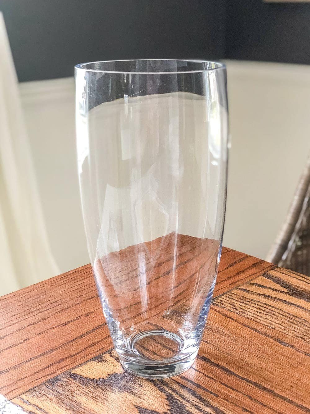 How to add a stoneware look to thrifted glass vases and bottles using just paint. #stoneware #diystoneware #stonewarevase