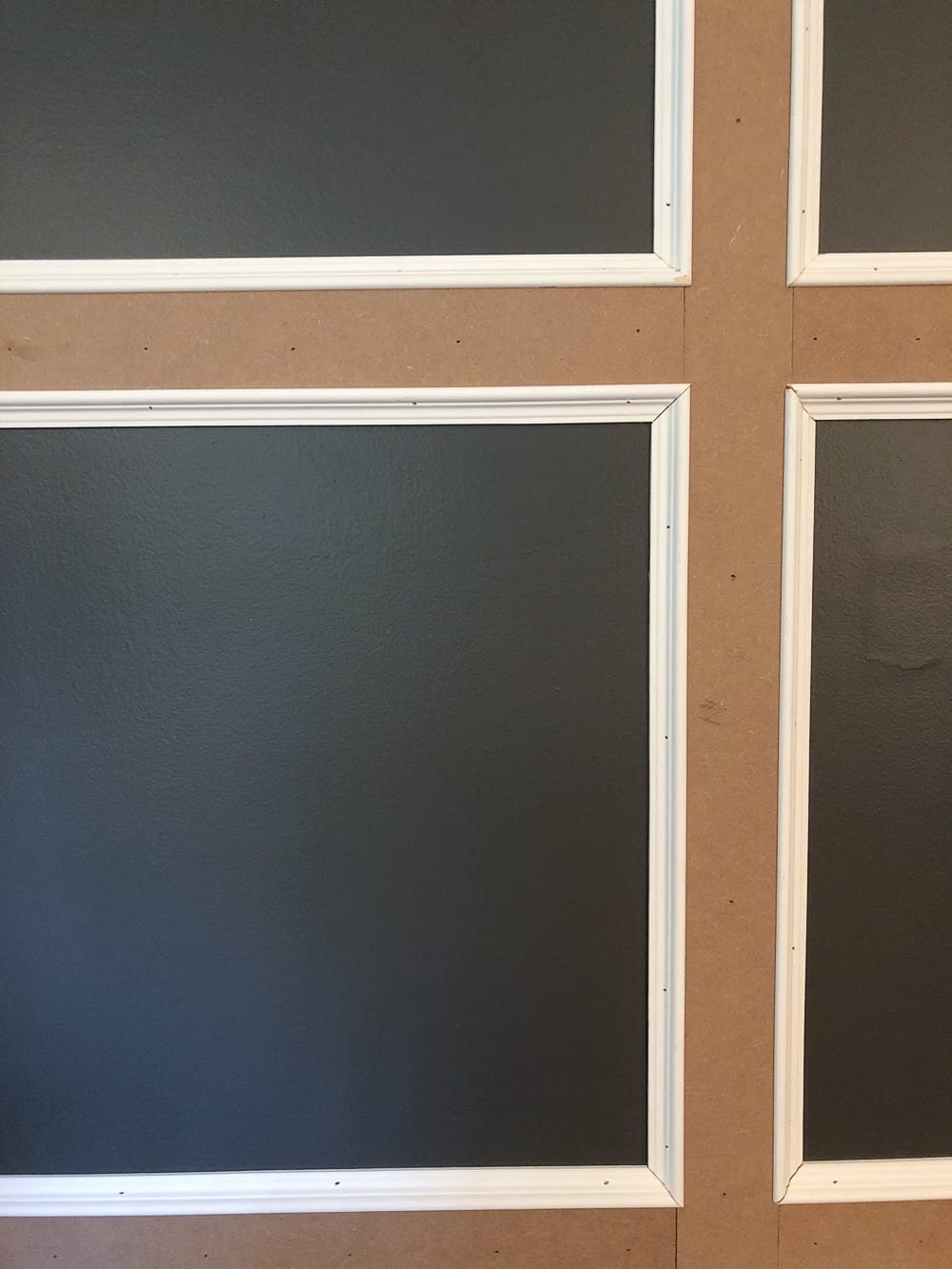 DIY Traditional Style Grid Molding Focal Wall | How to build a traditional style board and batten grid molding focal wall to add character and depth to any room.