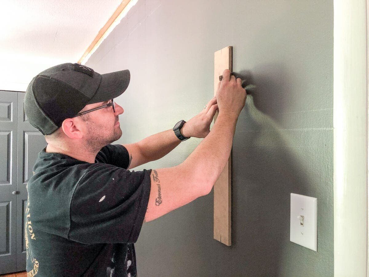 DIY Traditional Style Grid Molding Focal Wall | How to build a traditional style board and batten grid molding focal wall to add character and depth to any room.