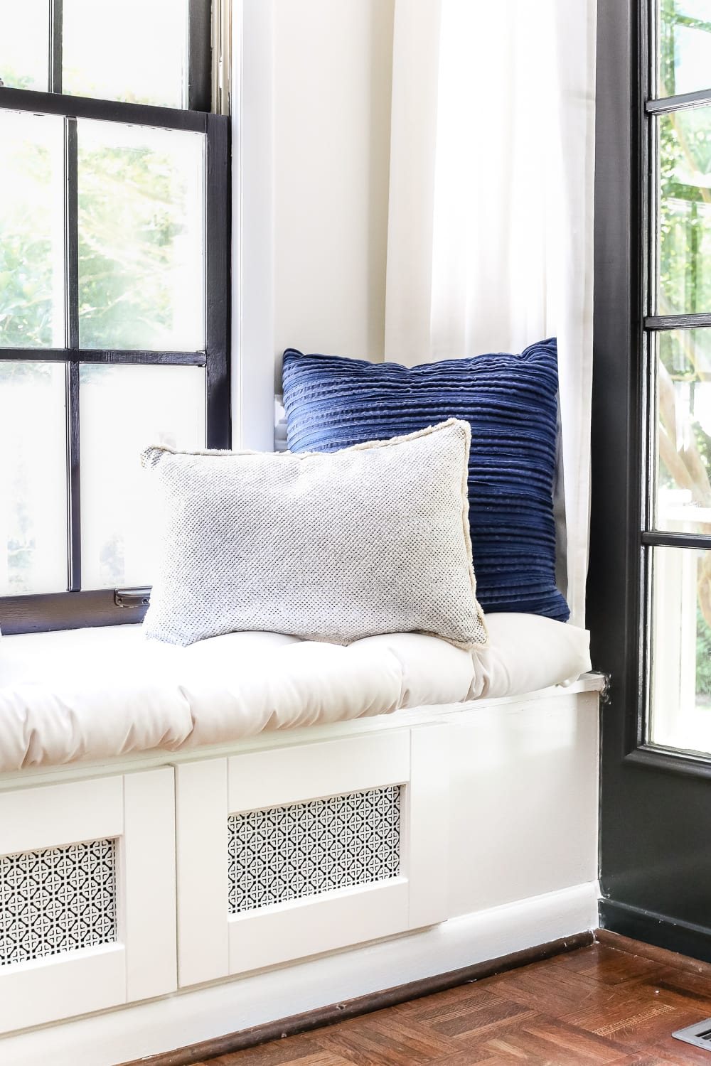 DIY Window Seat from a Kitchen Cabinet | unigumushane.com - A simplified tutorial for how to build a DIY window seat using a prefabbed kitchen cabinet to house electronics and hide cords.