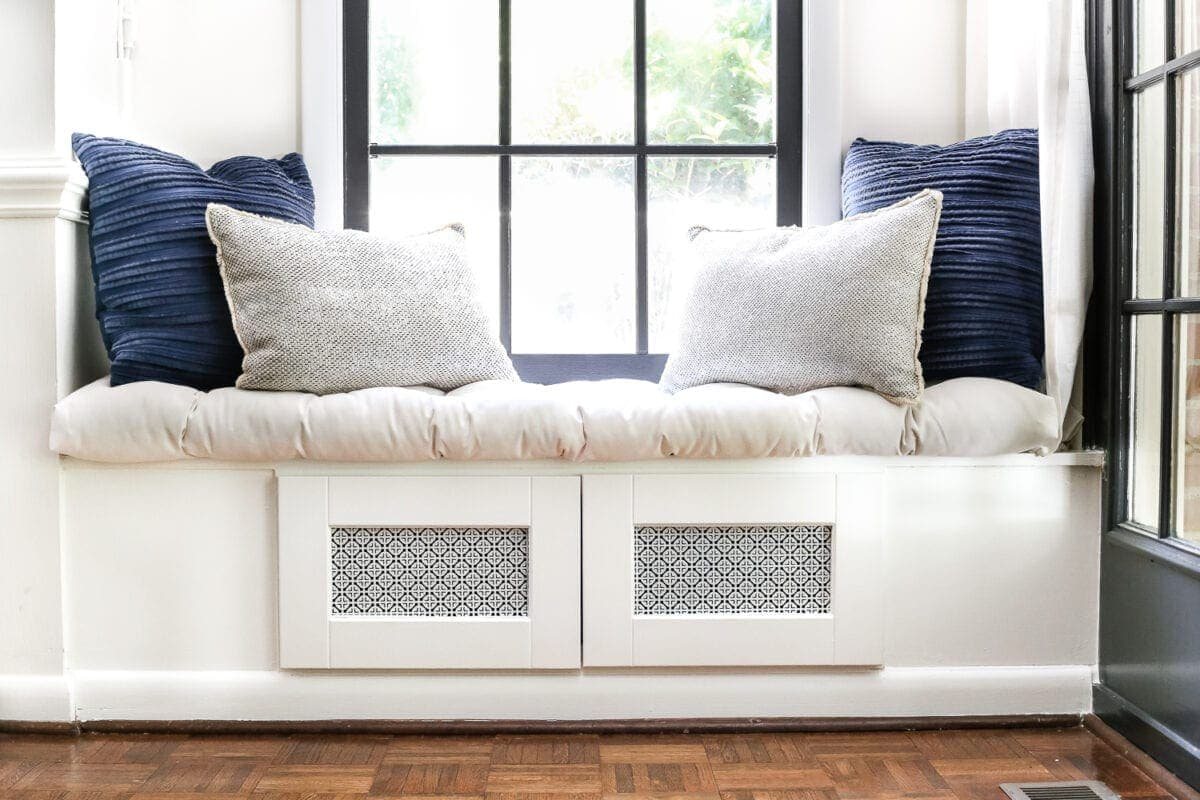 DIY Window Seat from a Kitchen Cabinet | unigumushane.com - A simplified tutorial for how to build a DIY window seat using a prefabbed kitchen cabinet to house electronics and hide cords.