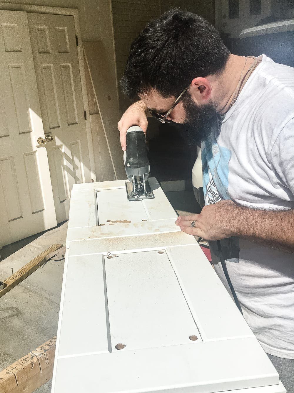DIY Window Seat from a Kitchen Cabinet | unigumushane.com - A simplified tutorial for how to build a DIY window seat using a prefabbed kitchen cabinet to house electronics and hide cords.