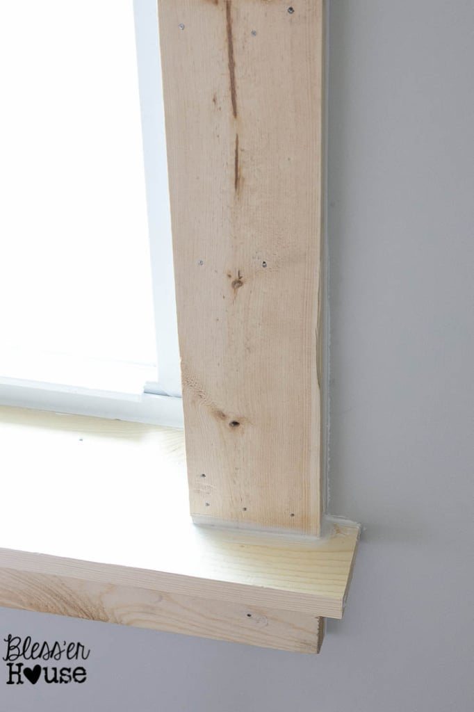 add caulk to hide gaps around interior window casing