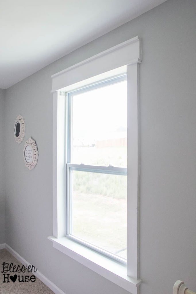 simple window casing using basic lumber with no miter cuts painted and caulked