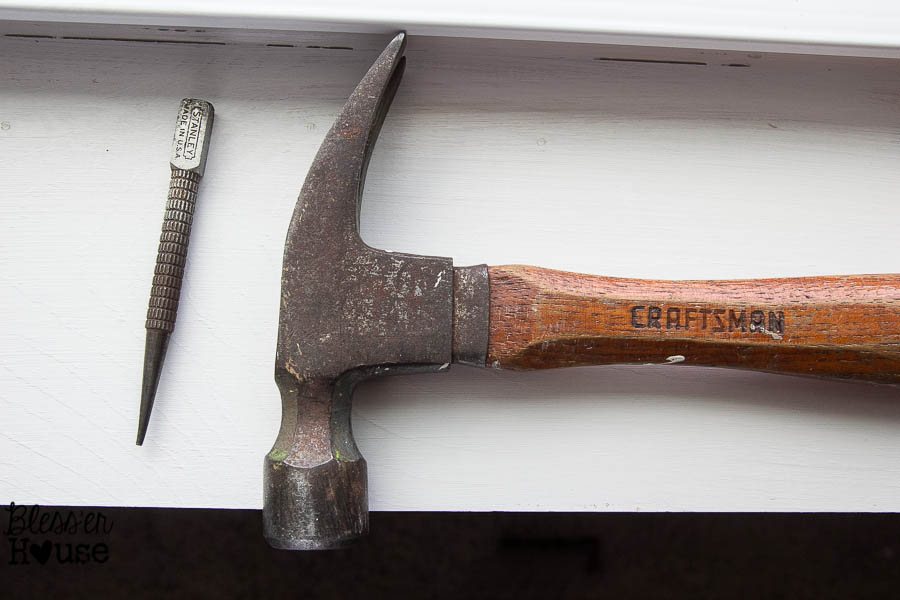 set finishing nails around window casing with a nail setter