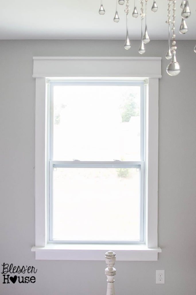 finished interior window trim painted and caulked using basic lumber with no miter cuts
