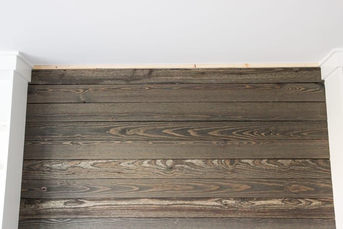 DIY Reclaimed Wood Plank Focal Wall | unigumushane.com - How to install a reclaimed wood plank focal wall in under an hour to create contrast, texture, and character in any space.