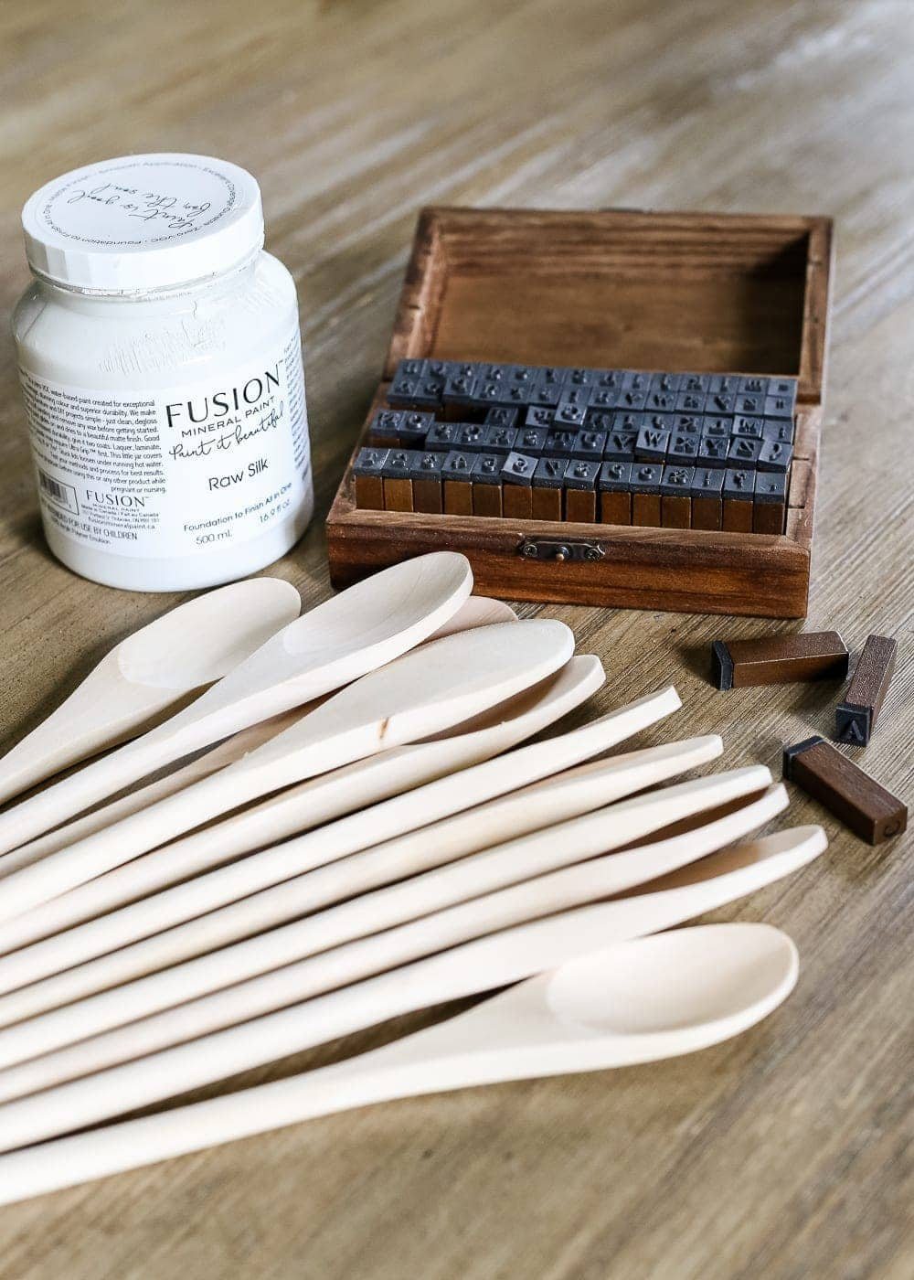 DIY Wooden Spoon Garden Markers | unigumushane.com - A simple tutorial for how to craft your own vintage-inspired garden markers made from wooden spoons, plus a resource for a beautiful stacked herb garden.